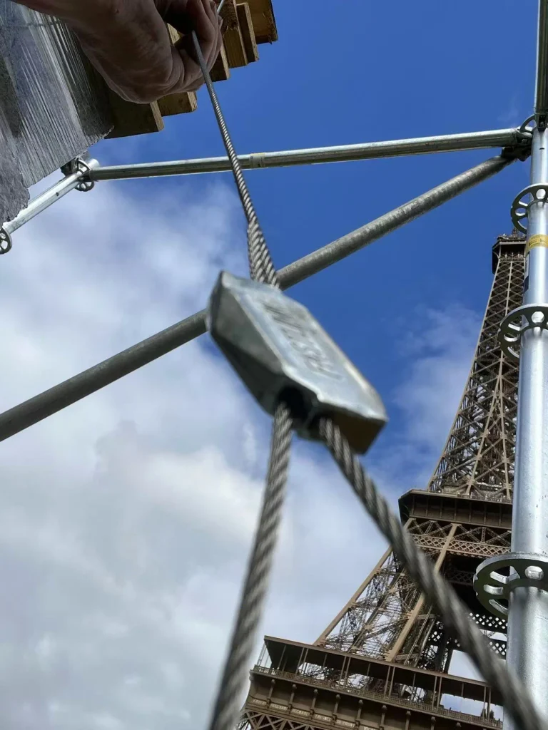 Close-up of FASTLINK Wire Joiner connecting steel wire ropes near the Eiffel Tower in Paris